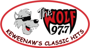97.7 the wolf logo